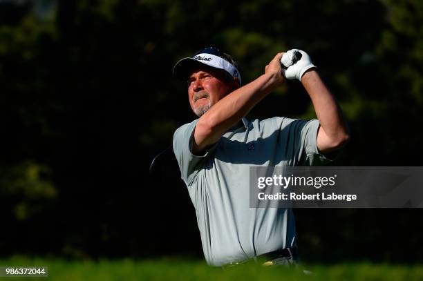 Jim McGovern makes a tee shot on the 12th hole during round one of the U.S. Senior Open Championship at The Broadmoor Golf Club on June 28, 2018 in...