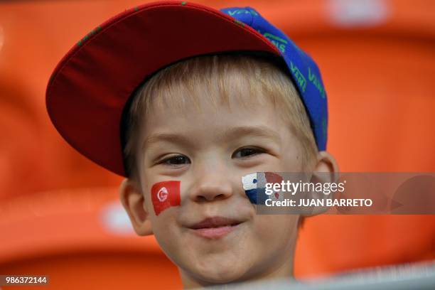 Supporter poses ahead of the Russia 2018 World Cup Group G football match between Panama and Tunisia at the Mordovia Arena in Saransk on June 28,...