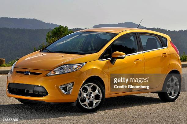 The 2011 Ford Fiesta subcompact car is photographed near Half Moon Bay, California, U.S., on Thursday, April 22, 2010. The five door hatchback is...