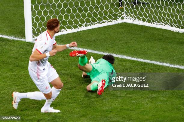 Tunisia's forward Fakhreddine Ben Youssef scores against Panama's goalkeeper Jaime Penedo during the Russia 2018 World Cup Group G football match...