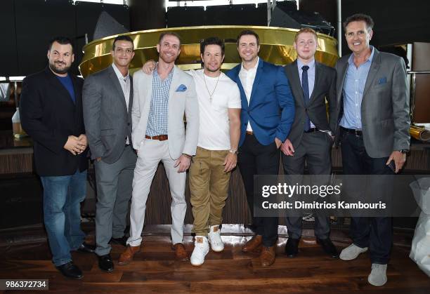 Mark Wahlberg poses with guests and Joe Morrissey at the Ocean Resort Casino opening weekend ribbon cutting ceremony on June 28, 2018 in Atlantic...