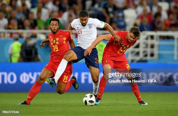 Ruben Loftus-Cheek of England is tackled by Mossua Dembele and Leander Dendoncker of Belgium during the 2018 FIFA World Cup Russia group G match...