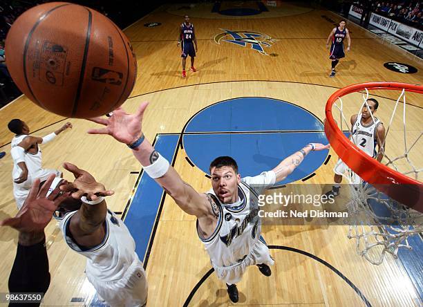 Mike Miller of the Washington Wizards reaches for a rebound during the game against the Atlanta Hawks at the Verizon Center on April 10, 2010 in...