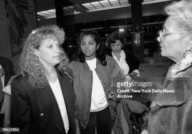 Maria Lugo, mother or victim, aunt Berkis Cabbal and grandmother Bienvenida Wynns, outside court after defendant Enrique Rodriguez was convicted of...