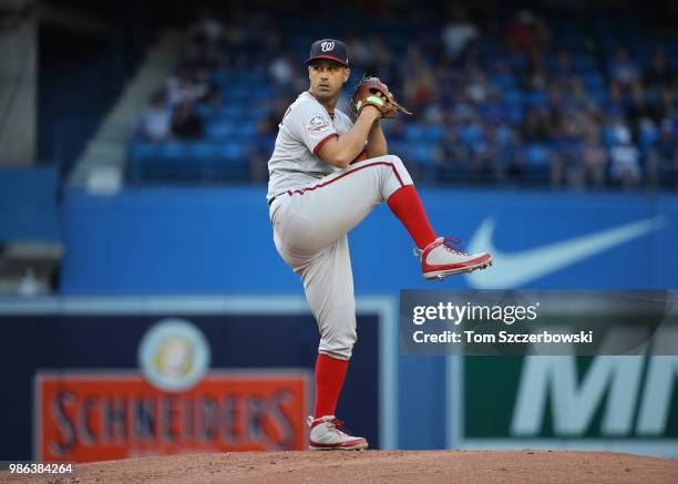 Gio Gonzalez of the Washington Nationals delivers a pitch in the first inning during MLB game action against the Toronto Blue Jays at Rogers Centre...