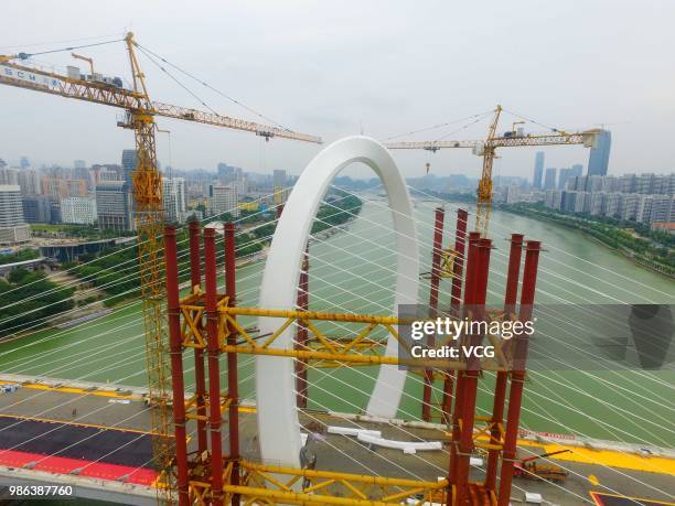 Aerial view of the construction site of Baisha Bridge on June 21, 2018 in Liuzhou, Guangxi Zhuang Autonomous Region of China. Baisha Bridge, the...