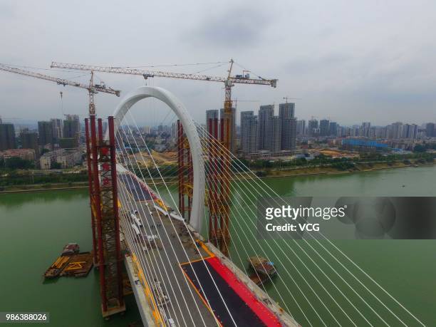 Aerial view of the construction site of Baisha Bridge on June 21, 2018 in Liuzhou, Guangxi Zhuang Autonomous Region of China. Baisha Bridge, the...
