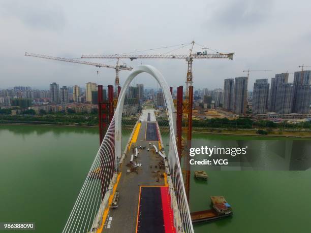 Aerial view of the construction site of Baisha Bridge on June 21, 2018 in Liuzhou, Guangxi Zhuang Autonomous Region of China. Baisha Bridge, the...