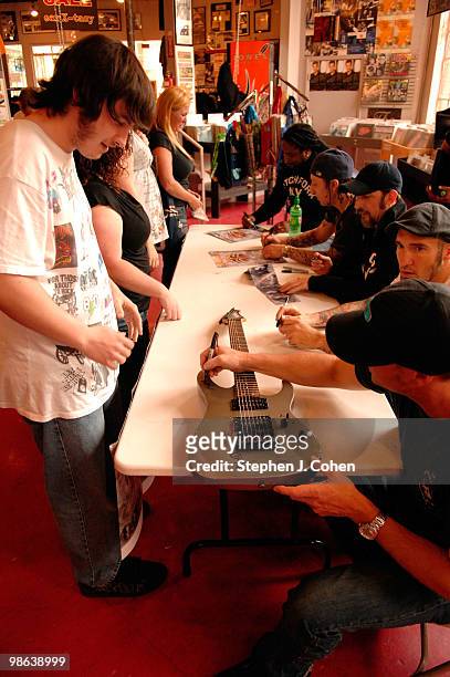 Vincent Hornsby, Clint Lowery, John Connolly, Morgan Rose, and Lajon Witherspoon attends the Sevendust signing in-store at Ear-X-Tacy on April 22,...