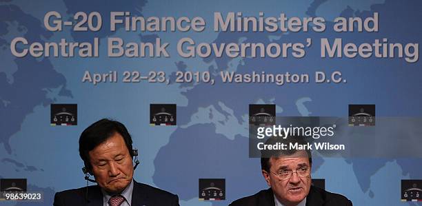 South Korean Finance Minister Yoon Jeung-hyun and Canadian Finance Minister Jim Flaherty participate in a news conference at the International...