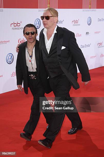 Ben Becker and guest attend the German film award at Friedrichstadtpalast on April 23, 2010 in Berlin, Germany.