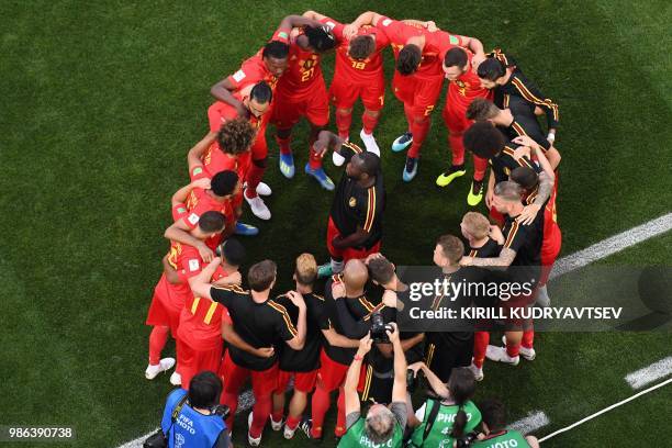 Belgium's forward Romelu Lukaku gives a pre-match team talk on the sideline prior to the Russia 2018 World Cup Group G football match between England...
