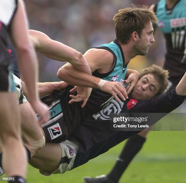 Darryl Wakelin of Port Adelaide and Matthew Lappin of Carlton in action in the match between Port Power and the Carlton Blues in round 12 of the AFL...