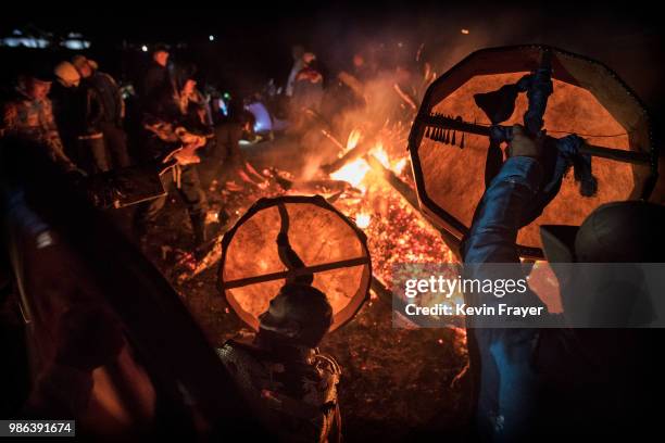 Mongolian followers of Shamanism or Buu murgul take part in a fire ritual meant to summon spirits to mark the period of the Summer Solstice early...