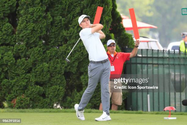 Russell Henley of the United States drives from the 9th tee during the Final Round of the Travelers Championship on June 24, 2018 at TPC River...