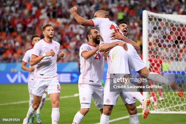 Wahbi Khazri of Tunisia celebrates with teammates after scoring his sides second goal during the 2018 FIFA World Cup Russia group G match between...