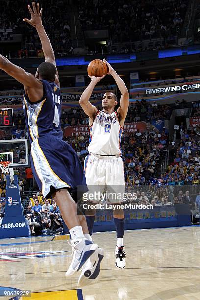 Thabo Sefolosha of the Oklahoma City Thunder shoots a jump shot against Sam Young of the Memphis Grizzlies during the game at Ford Center on April...
