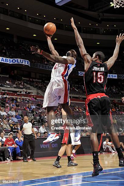 Will Bynum of the Detroit Pistons shoots a layup against Amir Johnson of the Toronto Raptors during the game at the Palace of Auburn Hills on April...