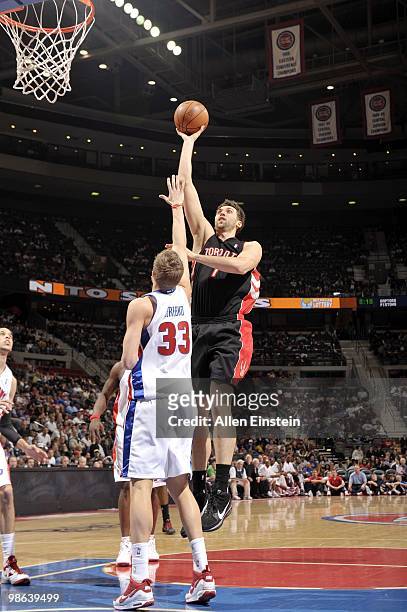 Andrea Bargnani of the Toronto Raptors shoots a jump shot against Jonas Jerebko of the Detroit Pistons during the game at the Palace of Auburn Hills...