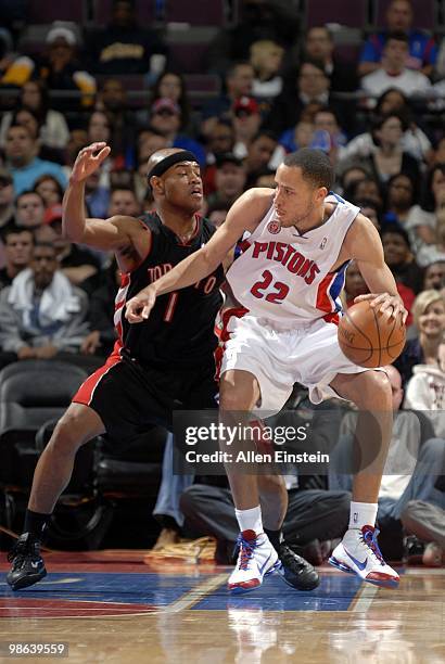 Tayshaun Prince of the Detroit Pistons moves the ball against Jarrett Jack of the Toronto Raptors during the game at the Palace of Auburn Hills on...