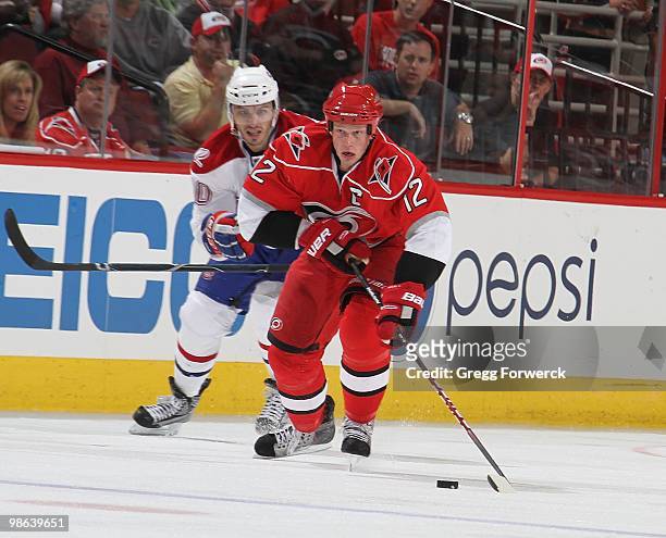 Eric Staal of the Carolina Hurricanes skates with the puck during a NHL game against the Montreal Canadiens on April 8, 2010 at RBC Center in...
