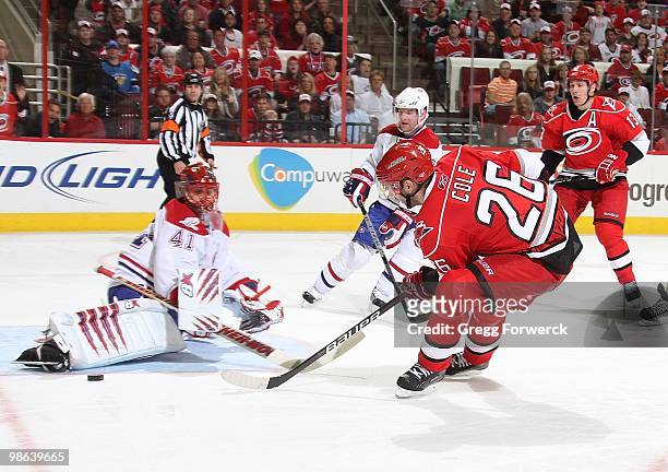 Erik Cole of the Carolina Hurricanes gets a breakaway opportunity but is stopped on a save by Jaroslav Halak of the Montreal Canadiens during a NHL...