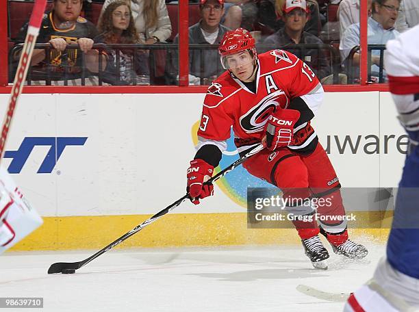 Ray Whitney of the Carolina Hurricanes controls the puck and looks to make a pass during a NHL game against the Montreal Canadiens on April 8, 2010...