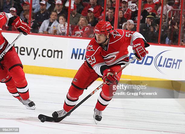 Chad LaRose of the Carolina Hurricanes carries the puck during a NHL game against the Montreal Canadiens on April 8, 2010 at RBC Center in Raleigh,...