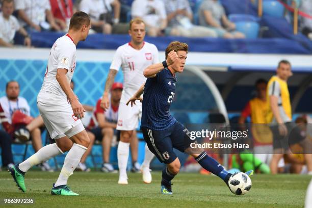 Gotoku Sakai of Japan kicks the ball during the 2018 FIFA World Cup Russia group H match between Japan and Poland at Volgograd Arena on June 28, 2018...