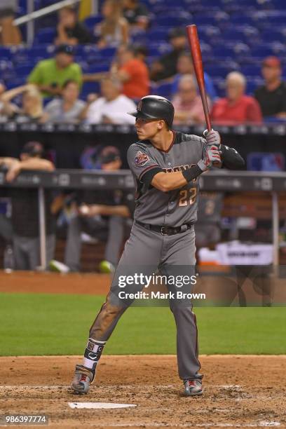 Jake Lamb of the Arizona Diamondbacks anticipates a pitch in the seventh inning during the game against the at Marlins Park on June 28, 2018 in...