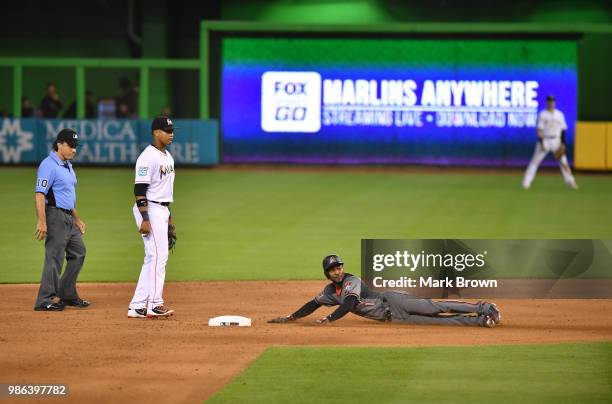 Jarrod Dyson of the Arizona Diamondbacks steal second base in the eighth inning during the game against the Miami Marlins at Marlins Park on June 28,...