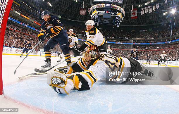 Jason Pominville of the Buffalo Sabres scores a first period goal past Tuukka Rask and Andrew Ference of the Boston Bruins in Game Five of the...