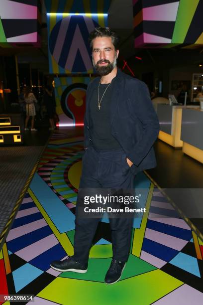 Jack Guiness attends Adam Nathaniel Furman's 'Chromacolour Catwalk' for Artist Playground by Pullman on June 28, 2018 in London, England.
