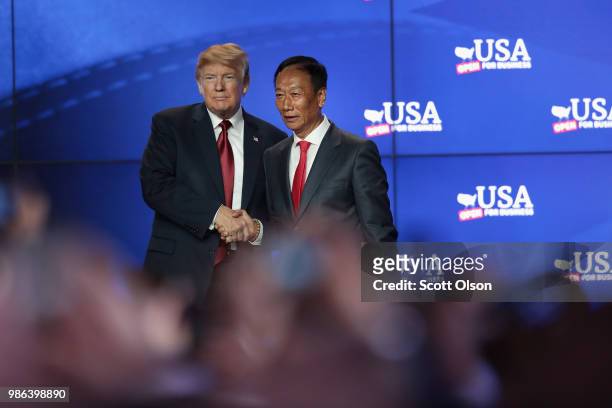 President Donald Trump and Terry Gou, chairman of Foxconn Technology Group, participate in a groundbreaking ceremony for the $10 billion Foxconn...