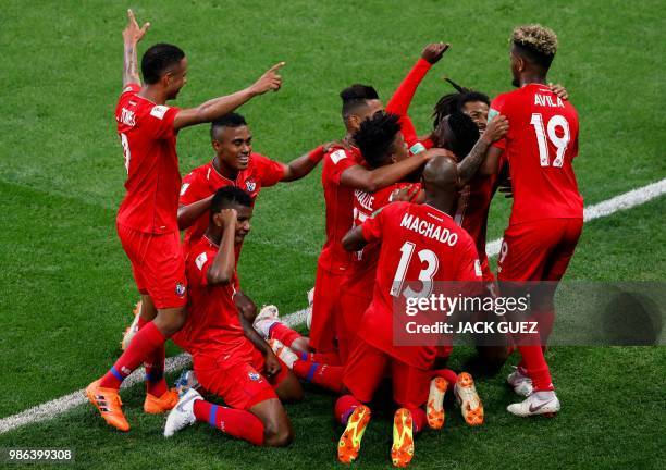 Panama's players celebrate after scoring during the Russia 2018 World Cup Group G football match between Panama and Tunisia at the Mordovia Arena in...