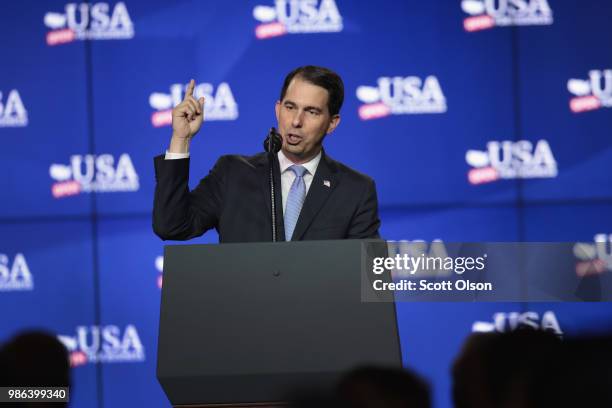 Scott Walker, governor of Wisconsin, speaks at a groundbreaking ceremony for the $10 billion Foxconn factory complex on June 28, 2018 in Mt....