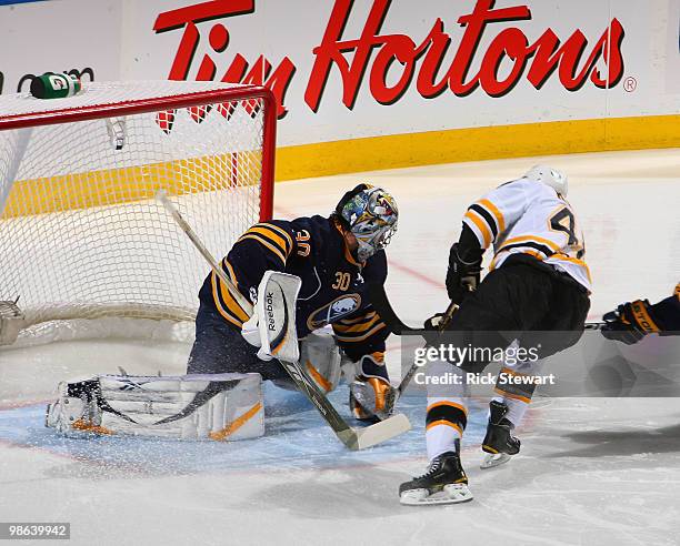 Ryan Miller of the Buffalo Sabres makes a save on David Krejci of the Boston Bruins in Game Five of the Eastern Conference Quarterfinals during the...