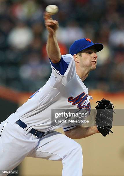 John Maine of the New York Mets delivers a pitch in the first inning against the Atlanta Braves on April 23, 2010 at Citi Field in the Flushing...