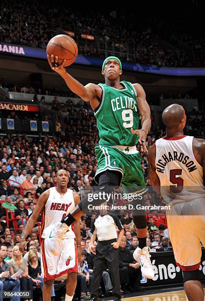 Rajon Rondo of the Boston Celtics shoots against Quentin Richardson of the Miami Heat in Game Three of the Eastern Conference Quarterfinals during...