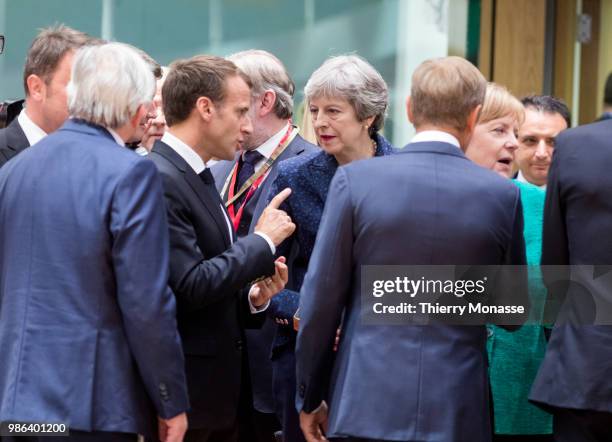 President of the European Commission Jean-Claude Juncker is talking with the French President Emmanuel Macron, the Prime Minister of the United...