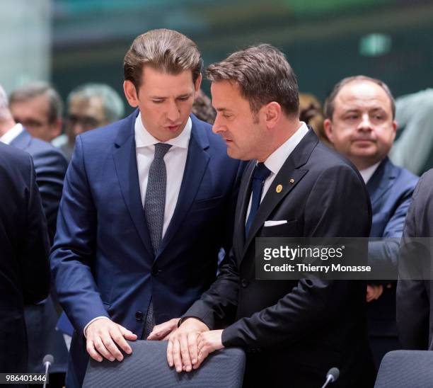 Austrian Chancellor Sebastian Kurz is talking with the Luxembourg Prime Minister Xavier Bettel during an EU Summit at European Council on June 28,...