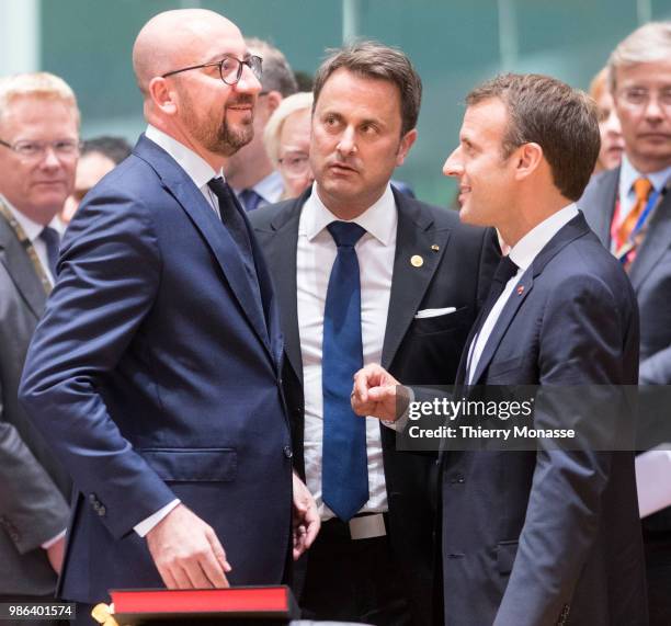 Belgium Prime Minister Charles Michel is talking with the Luxembourg Prime Minister Xavier Bettel and the French President Emmanuel Macron during an...