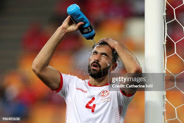 Yassine Meriah of Tunisia refreshes himself during the 2018 FIFA World Cup Russia group G match between Panama and Tunisia at Mordovia Arena on June...