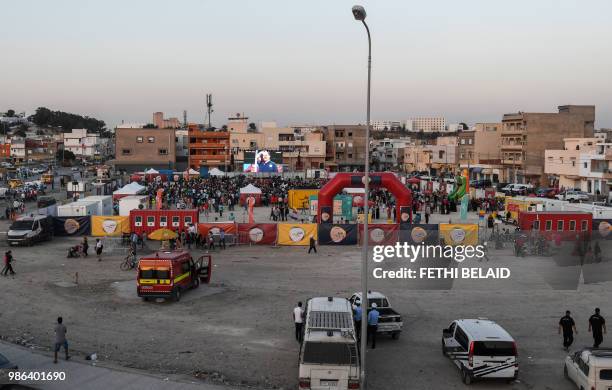 Tunisian football fans watch the Russia 2018 World Cup Group G match between Tunisia and Panama in the impoverished neighborhood of El-Mellassine in...