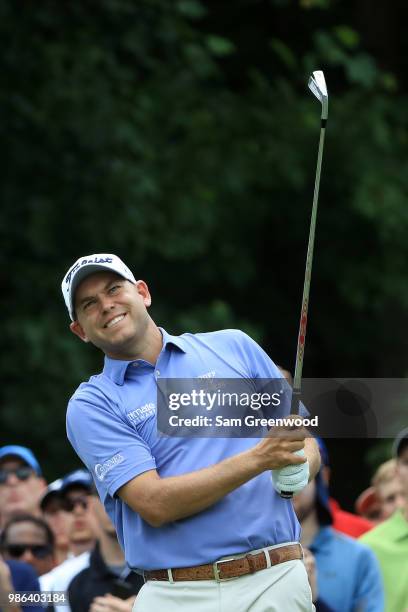 Bill Haas hits off the third tee during the first round of the Quicken Loans National at TPC Potomac on June 28, 2018 in Potomac, Maryland.