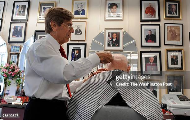 Longtime Dupont Circle neighborhood barber Diego D'Ambrosio worked carefully shaving Steve Levy's head on April 16, 2010 in Washington DC. D'Ambrosio...