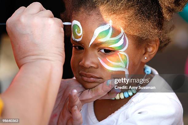 Children enjoy face painting at "Big" presented by Drive-In during The 2010 Tribeca Film Festival at the Cove at World Financial Center Plaza on...