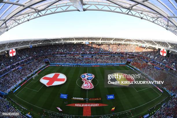 The teams line up prior to the Russia 2018 World Cup Group G football match between England and Belgium at the Kaliningrad Stadium in Kaliningrad on...