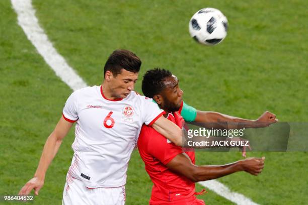Tunisia's defender Rami Bedoui fights for the ball with Panama's forward Luis Tejada during the Russia 2018 World Cup Group G football match between...