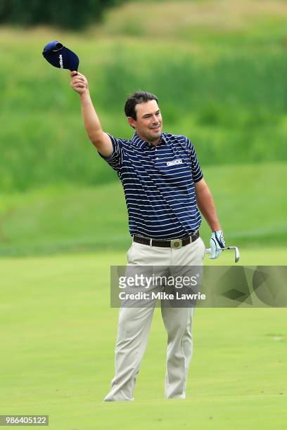 Johnson Wagner reacts after a shot on the sixth fairway during the first round of the Quicken Loans National at TPC Potomac on June 28, 2018 in...